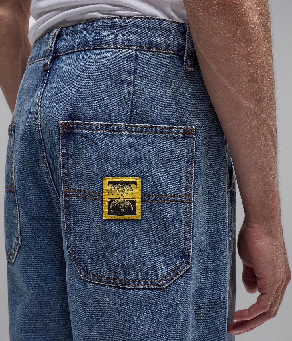 Reynolds Denim Pant - Mid Blue - on model