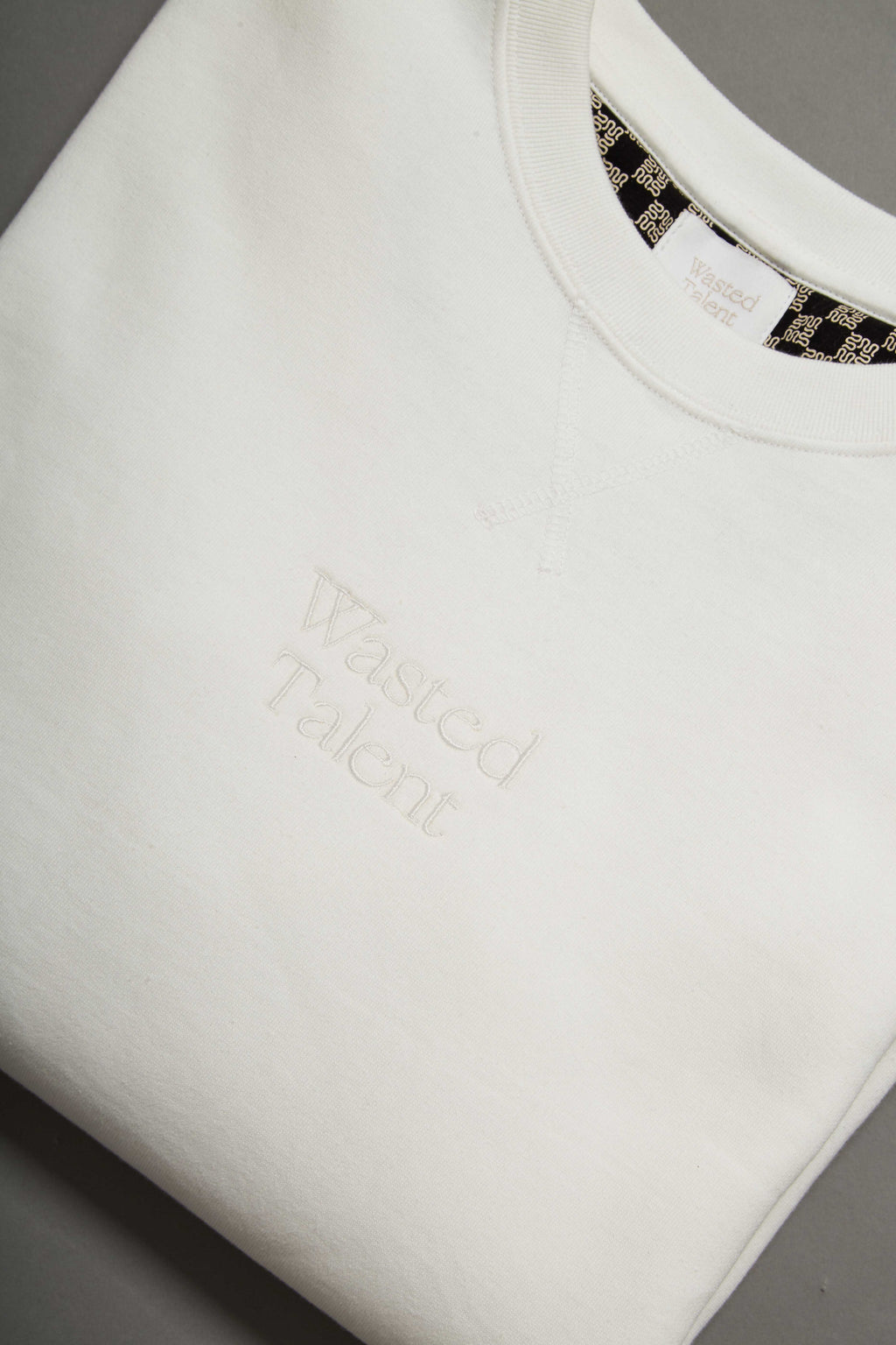 Wasted Talent Medoc Crew Neck Off White - flat lay side