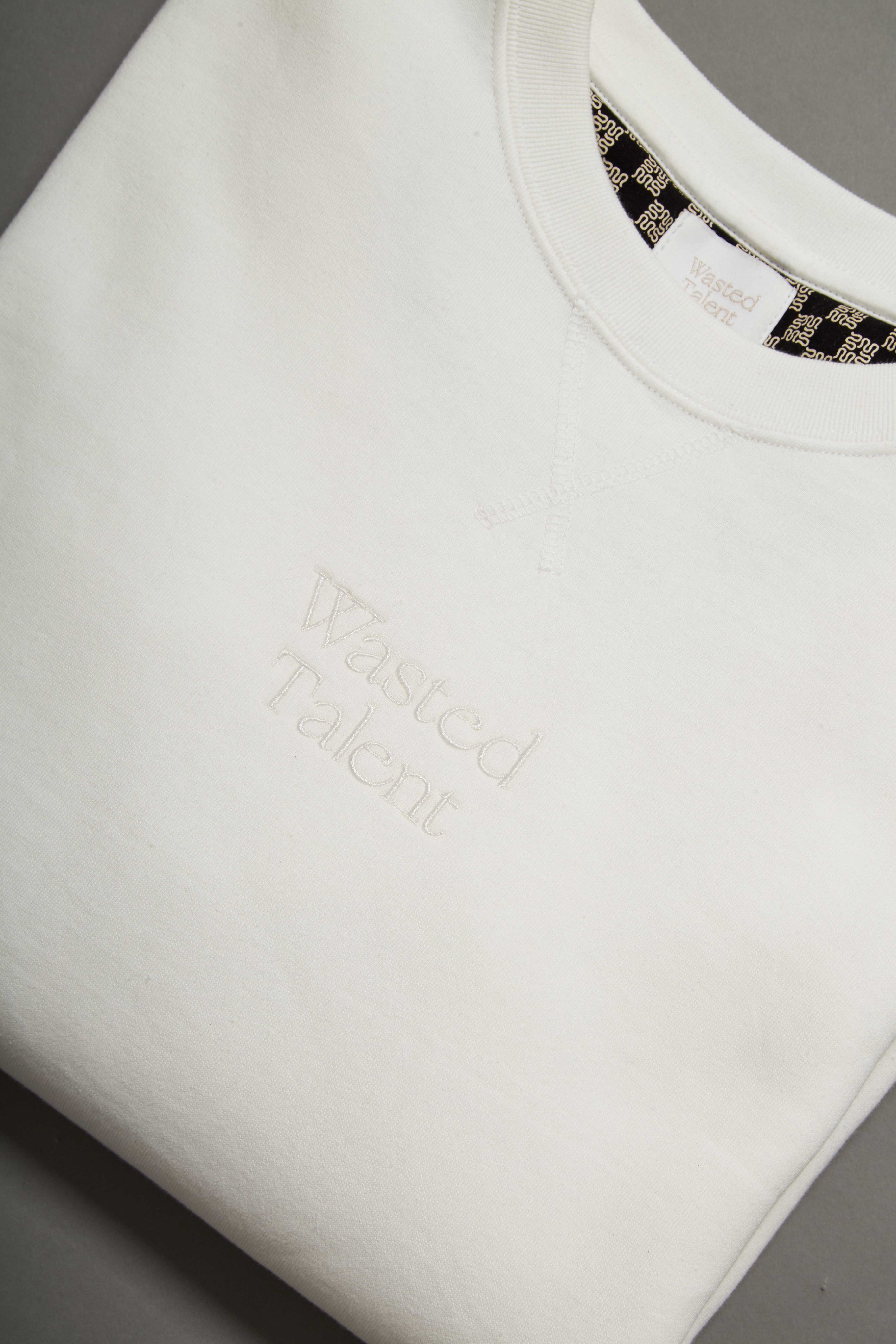 Wasted Talent Medoc Crew Neck Off White - flat lay side